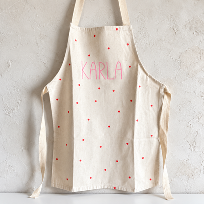 Kinderschürze Karla mit Name – Punkte, Pink oder Flieder