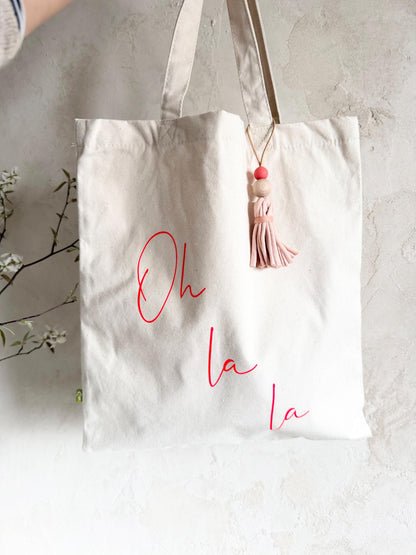 Stofftasche „Oh là là“ mit Quaste