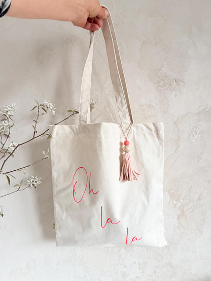Stofftasche „Oh là là“ mit Quaste